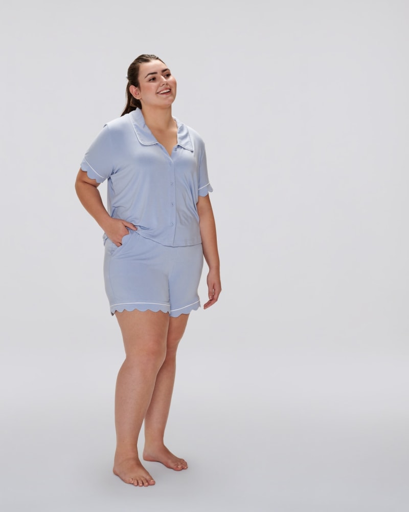 Front of a model wearing a size L Becca Scallop Sleep Shorts in Blue Heron by Cotidié. | dia_product_style_image_id:299965